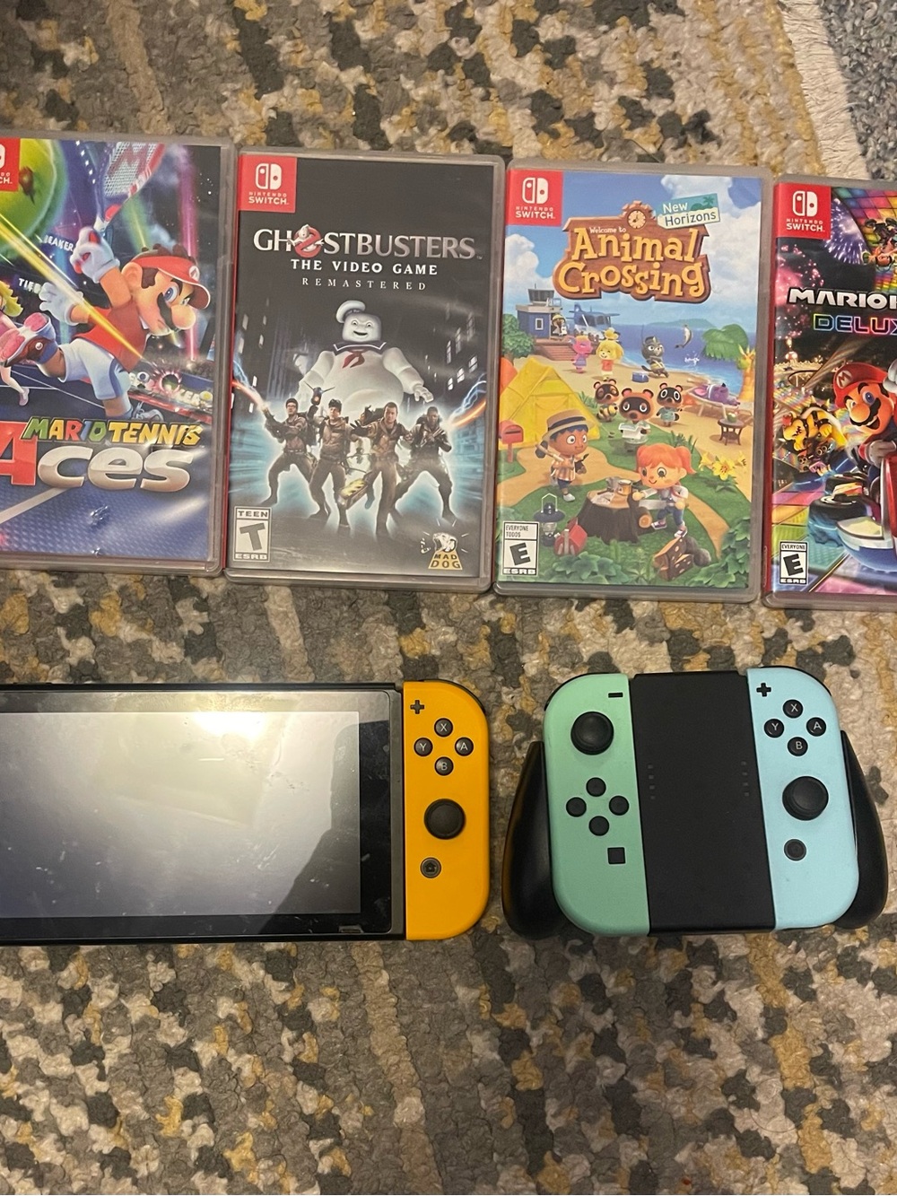 Nintendo Switch with Yellow Left Joy‑Con and Mint Right Joy‑Con